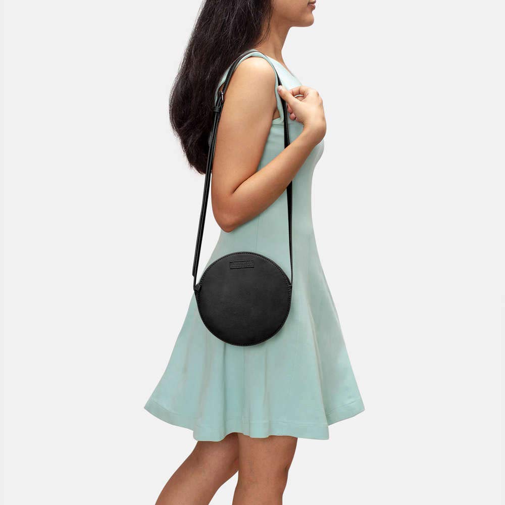 DailyObjects Orbis Round Sling Crossbody Bag For Women| Stylish Solid Black Faux Leather Purse With Slip Pocket & 2 Compartments Inside| Zip Closure & Adjustable Strap| Storage Space For Essentials