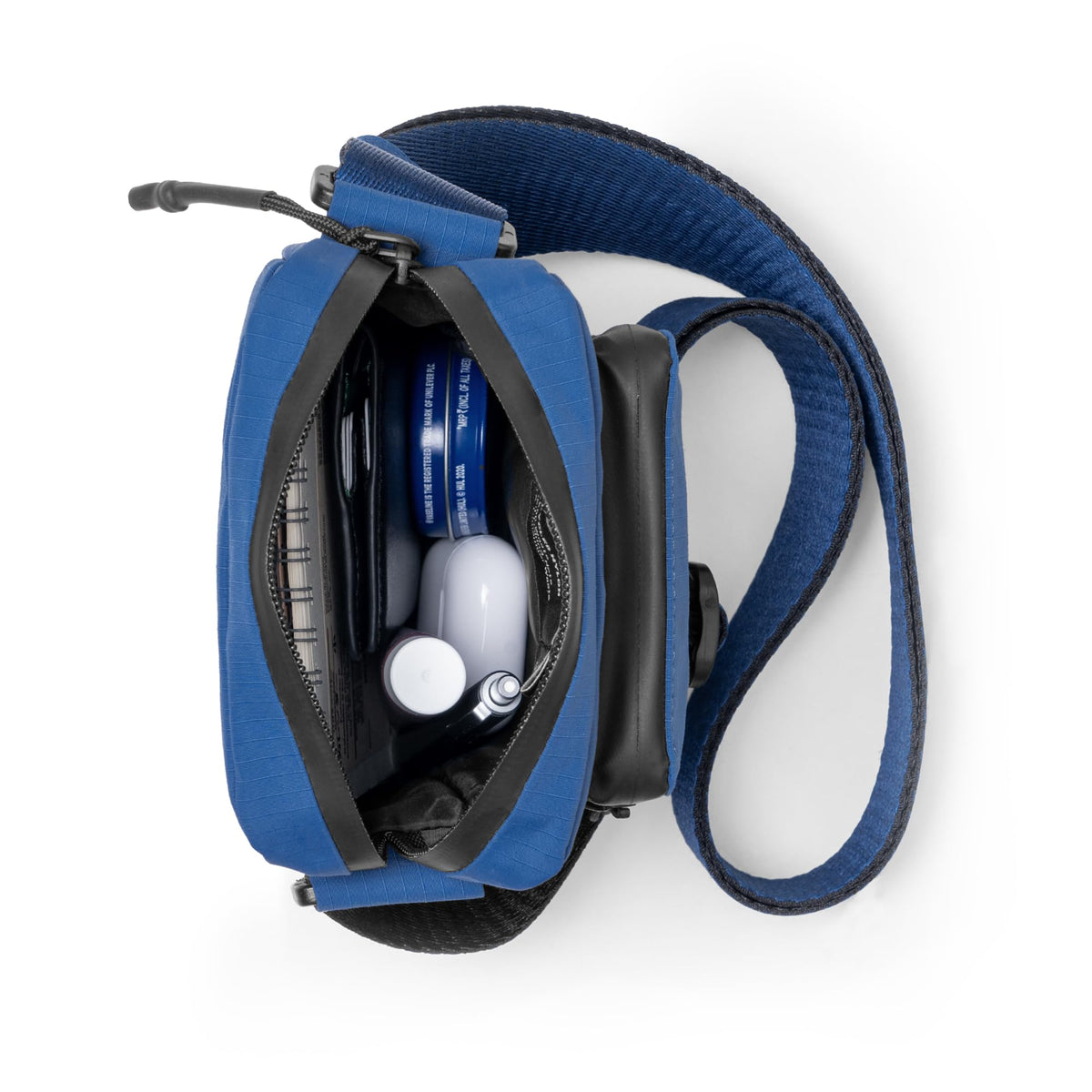 DailyObjects Pivot Travel Sling Bag for Men and Women|Adjustable Shoulder Strap|Recycled Lightweight Material|Water Repellent|Zippered Main Compartment|Slip Pockets| For Daily Use & Travel (Blue)