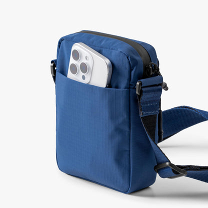 DailyObjects Pivot Travel Sling Bag for Men and Women|Adjustable Shoulder Strap|Recycled Lightweight Material|Water Repellent|Zippered Main Compartment|Slip Pockets| For Daily Use & Travel (Blue)