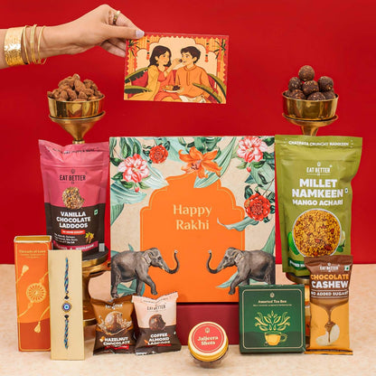 Jumbo Happy Rakhi Gift Hamper - 10-Item Raksha Bandhan Gift for Brother – Dry-Fruit Chocolate Laddoos, Chocolate Cashews, Evil Eye Rakhi with Roli-Chawal, Millet Namkeen & more | Premium Gift Hamper Combo Set