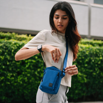DailyObjects Pivot Travel Sling Bag for Men and Women|Adjustable Shoulder Strap|Recycled Lightweight Material|Water Repellent|Zippered Main Compartment|Slip Pockets| For Daily Use & Travel (Blue)