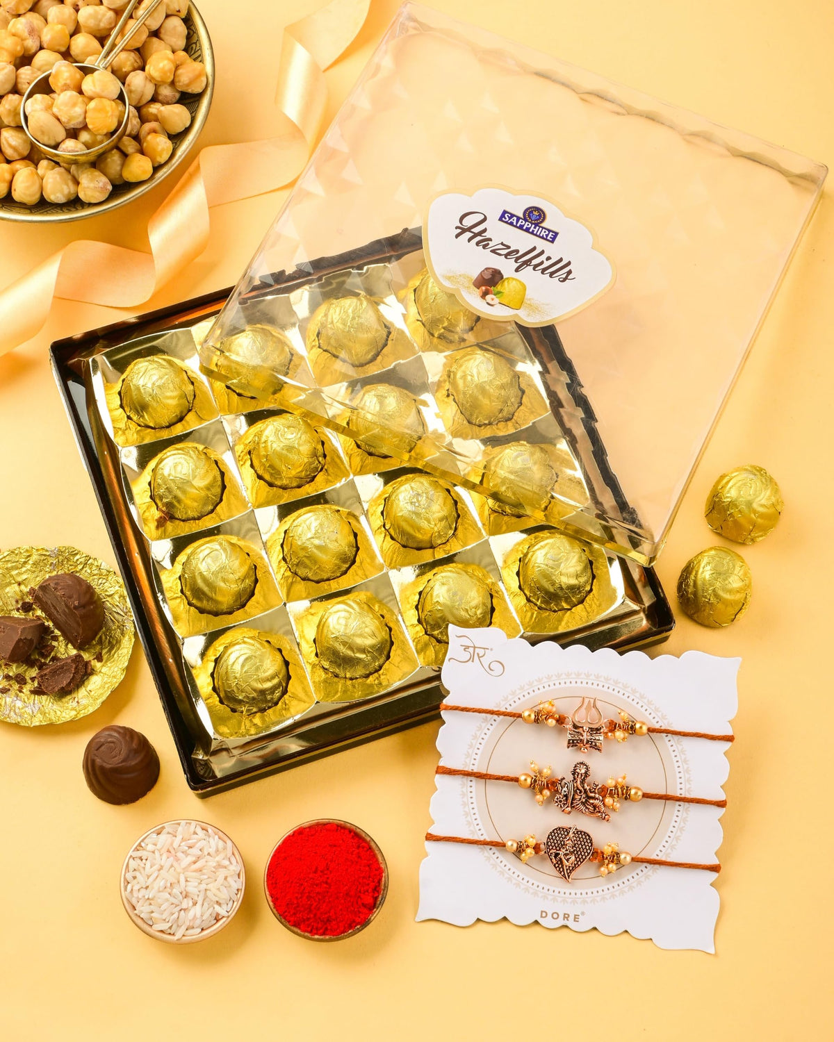 HyperFoods® Chocolates Gift Pack Rakhi For Brother Set of 3 Rakhi With Chocolates 3 Rakhi With Chocolates Gift Pack Chocolate Gifts Set of 3 Rakhi With Chocolate Hazelfills 16Pcs Trinity Rakhi Set 3
