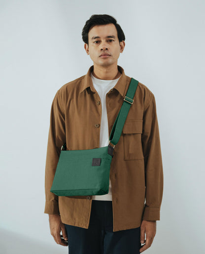 DailyObjects Unisex All Sunday Sling Crossbody Bag| Premium-Quality Solid Canvas Purse With Slip Pockets| Ergonomic Design| Handcrafted| Adjustable Shoulder Strap| Men & Women Essentials| Forest Green