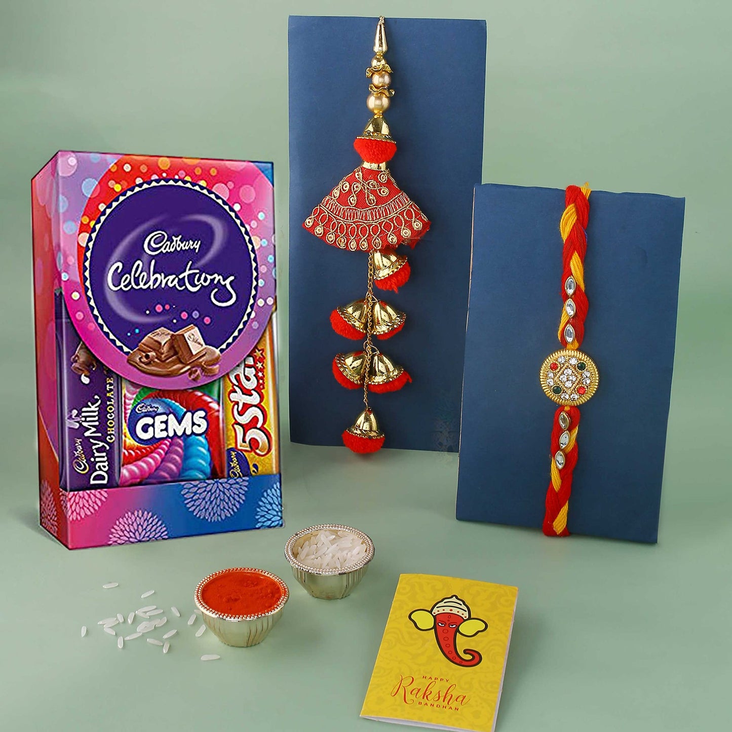 Rakhi Gift for Brother Bhabhi with Cadbury Celebration Chocolates Pack, Rakhi Gift for Bhaiya Bhabhi with Rakshabandhan Greeting Card, Stone Studded Beaded Floral Rakhi for Brother Bhabhi with Cadbury,Greeting Card, Tilak set