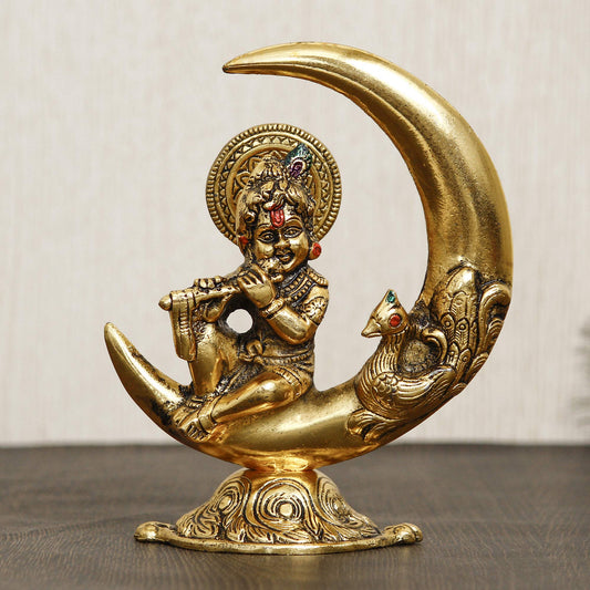 Golden Metal Handcrafted Lord Krishna Idol Playing Flute and Sitting On Half Moo