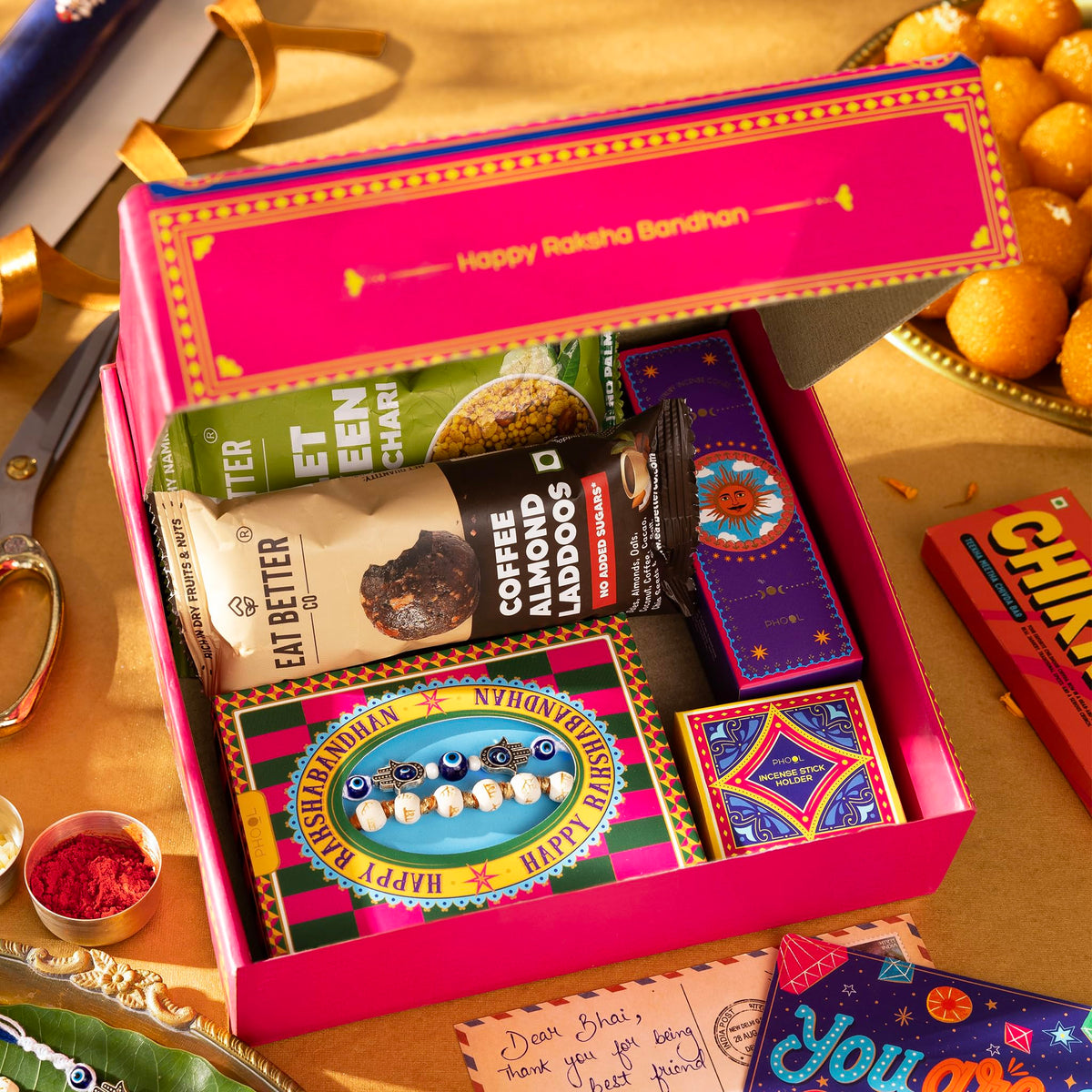 Phool Bandhan Rakhi Gift Hamper for Brother | 10-Item Rakhi Gift Set with 2 Rakhis, Incense, Laddoo & Chikki | Rakhi Gift Box for Brother | Rakshabandhan Gift Hamper with Sweets