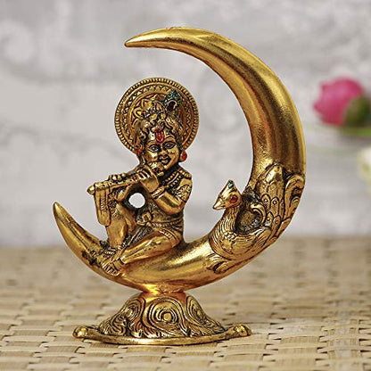 Golden Metal Handcrafted Lord Krishna Idol Playing Flute and Sitting On Half Moon Decorative Showpiece